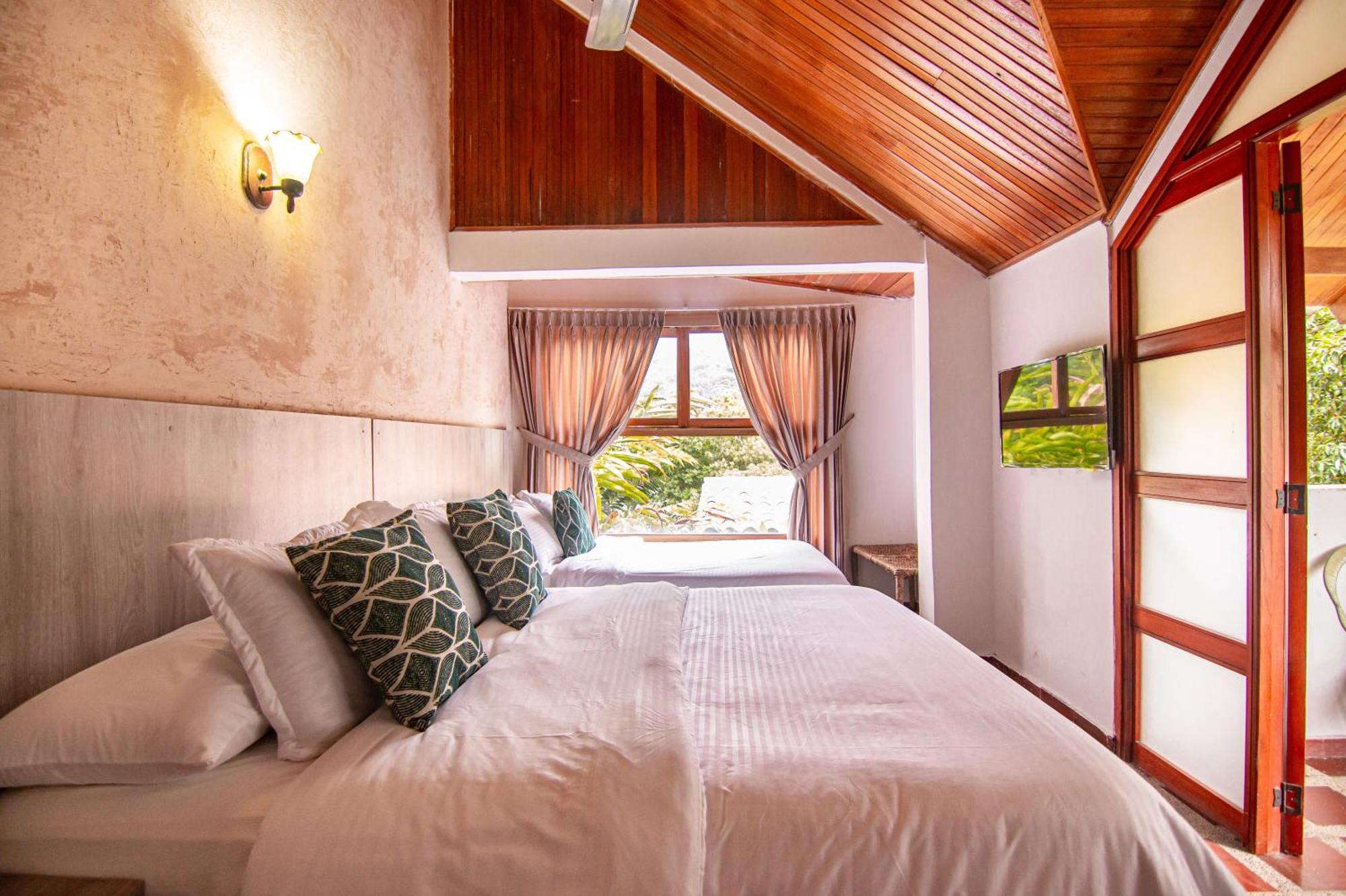 Portales Del Tayrona Garden Hotel Калабасо Экстерьер фото