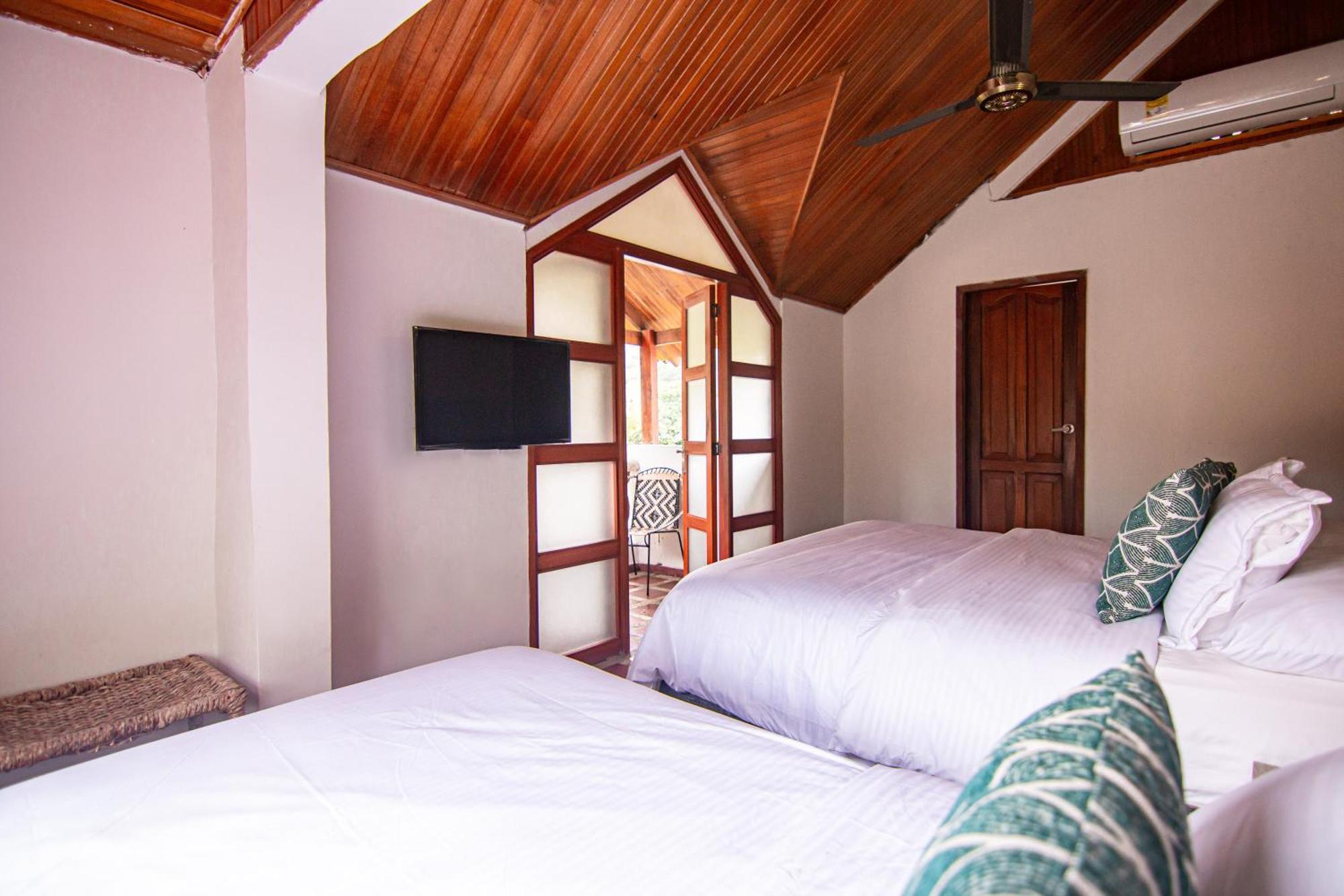 Portales Del Tayrona Garden Hotel Калабасо Экстерьер фото